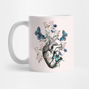 Human heart anatomy with blue butterflies and flowers, floral art of human heart Mug